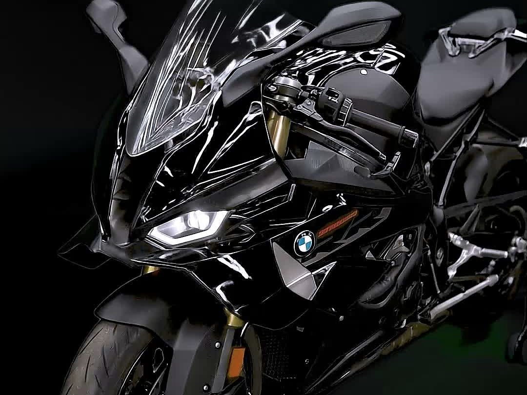 Black BMW S 1000 RR fairing, headlight and tank in the dark studio.