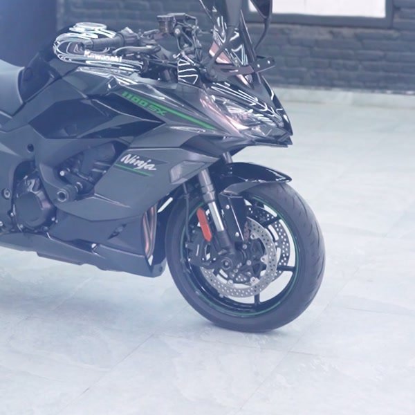 Kawasaki Ninja with film over its factory graphics.